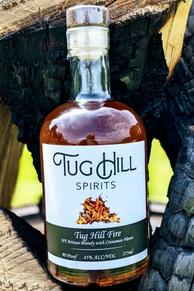 Tug Hill Fire - Tug Hill Estates camp fire firewood outside liquor bottle